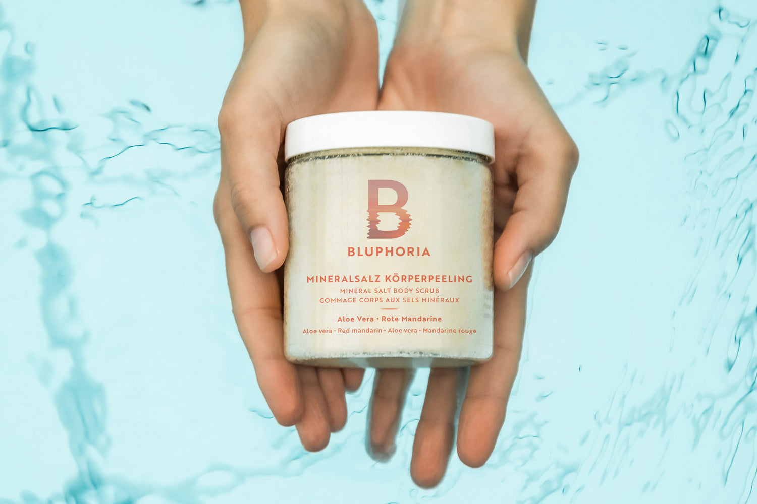 Gommage minéral corporel à l'aloe vera et à la mandarine rouge