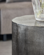 Table d'appoint ronde Rota avec façade rainurée