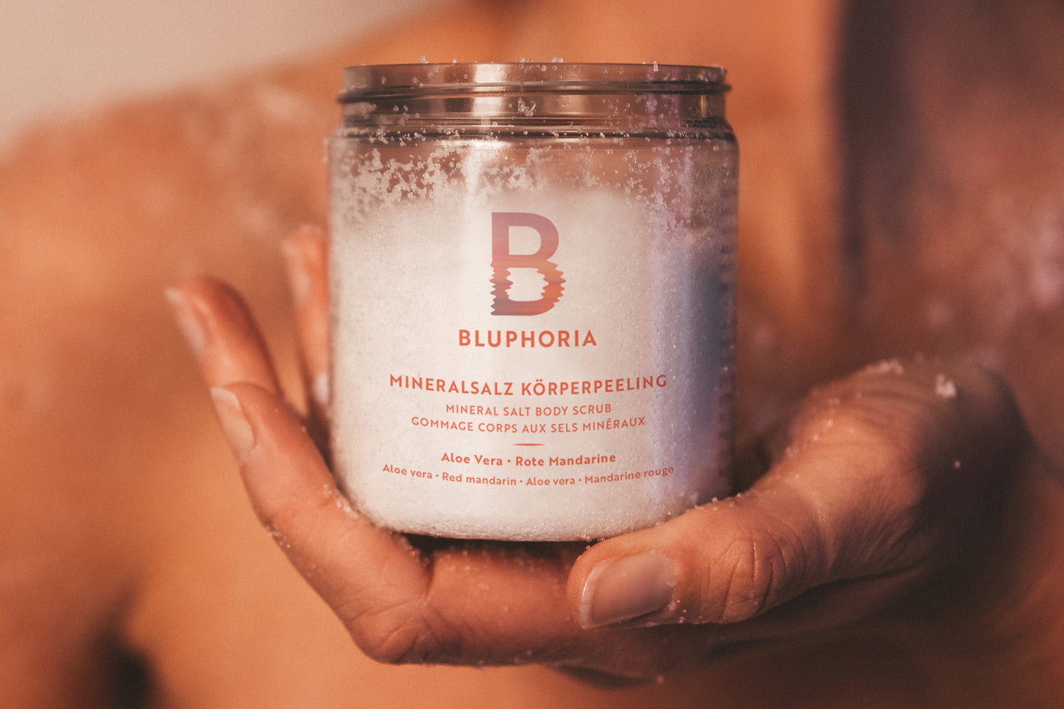 Gommage minéral corporel à l'aloe vera et à la mandarine rouge